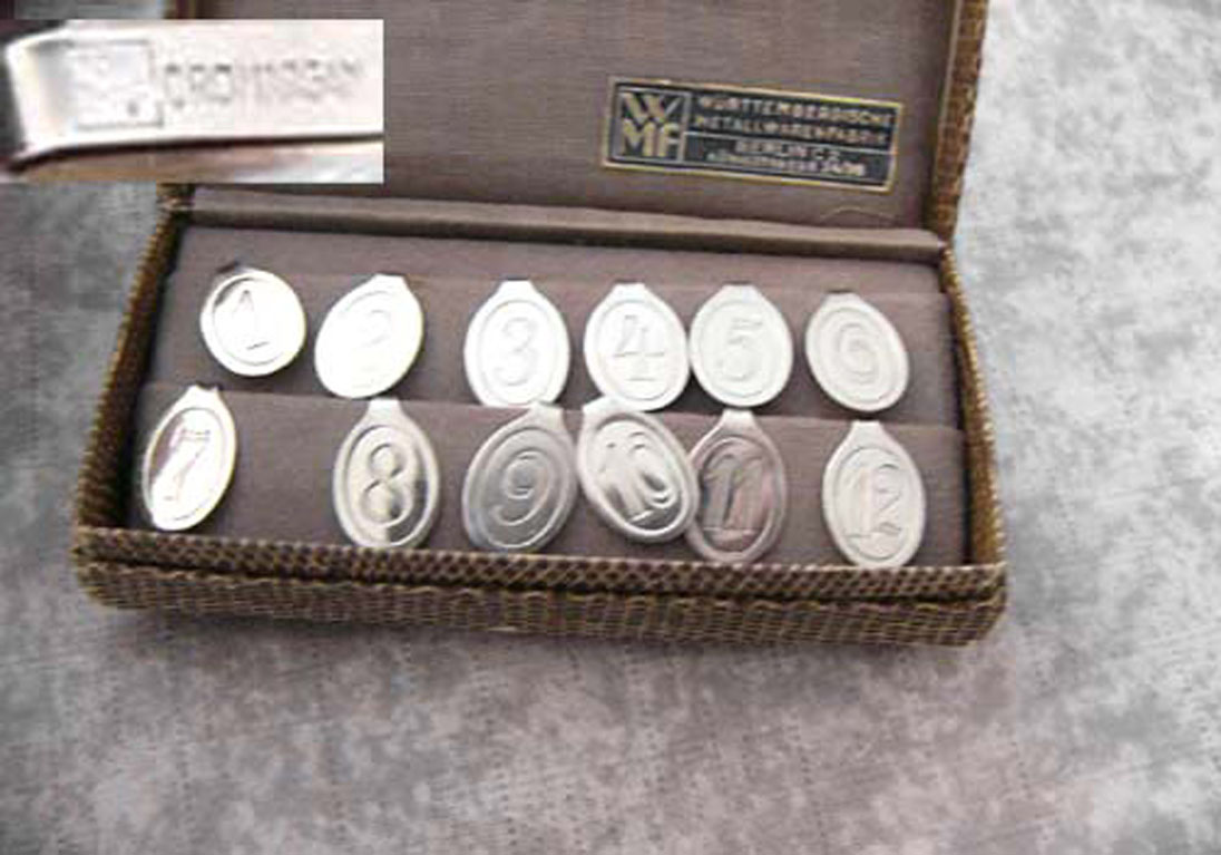 12 Platznummern von WMF aus Cromargan