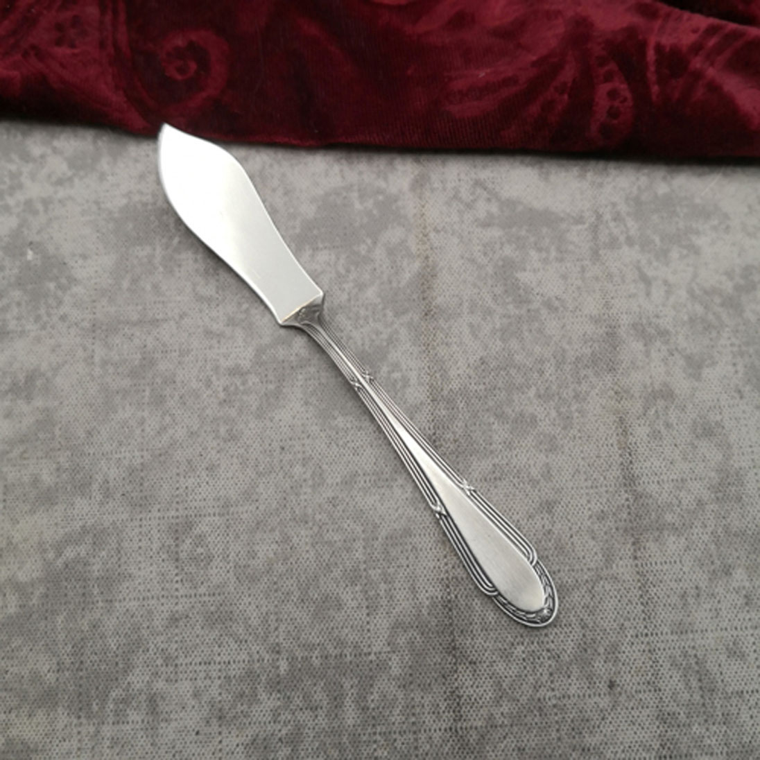 WMF 200 Kreuzband kleines Buttermesser versilbert