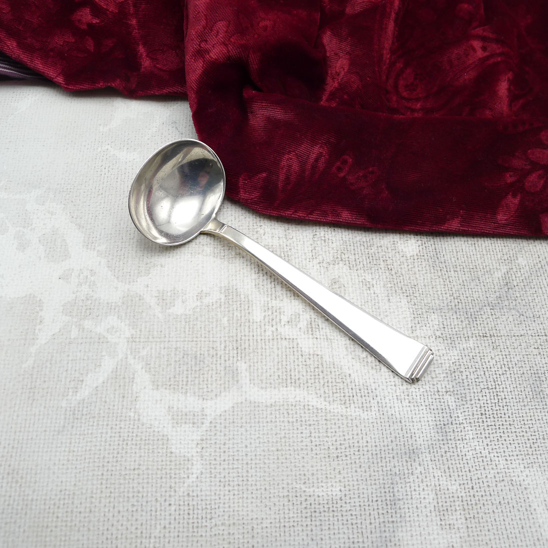 OKA 131 Art Deco Rahmkelle 90 versilbert