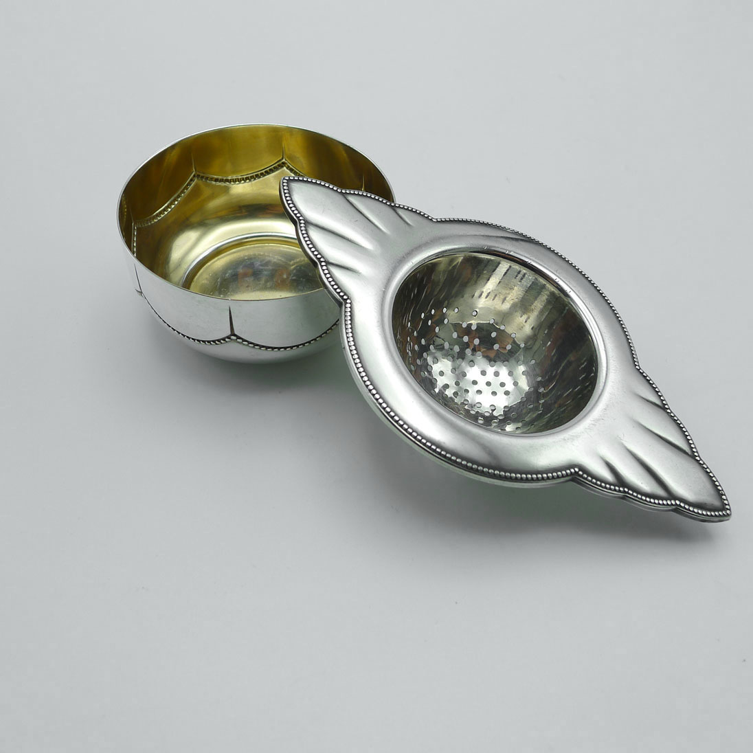 WMF 900 Fächer Teesieb mit Tropfschale versilbert