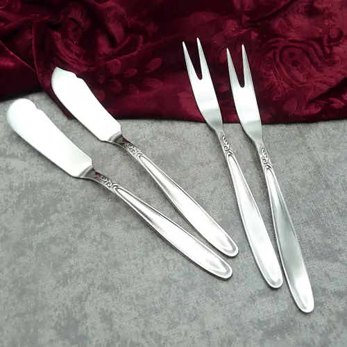 4 Vorlegeteile von Michelin 100 versilbert