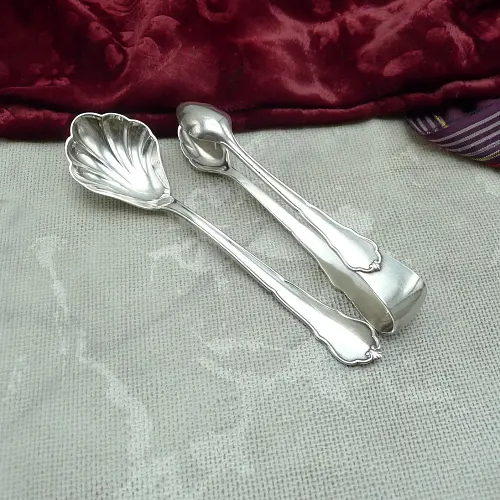 Hanseat Chippendale Zuckerzange und Löffel 90 versilbert