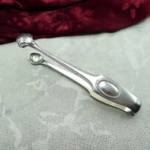 WMF 200 Kreuzband Zuckerzange lang 13,6cm versilbert